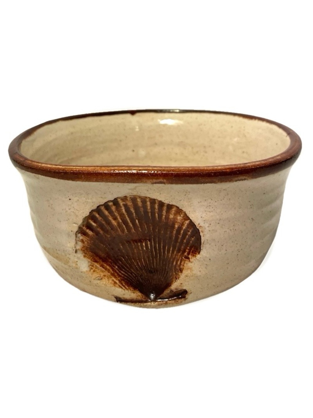 Handmade Glazed Ceramic Shell Bowl in Cream and Brown. Shell is imprinted